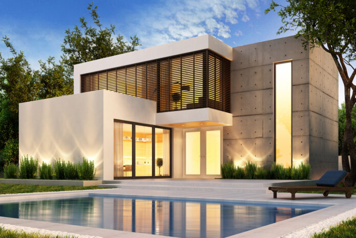 Eine Luxus Immobilie mit Pool in einem modernen Baustil